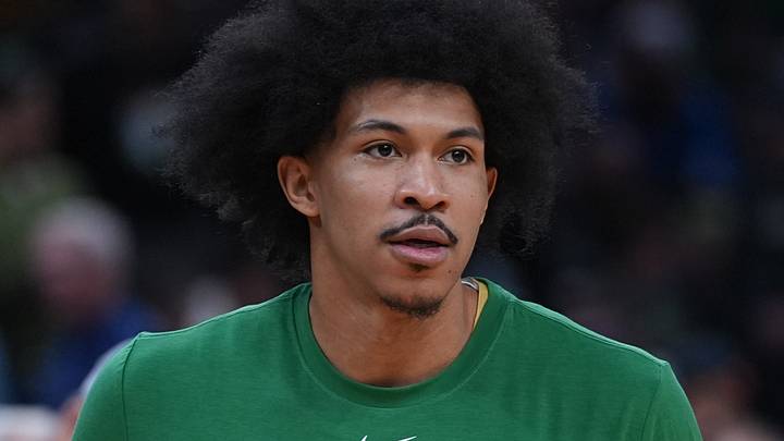 Feb 8, 2026; Boston, Massachusetts, USA; Boston Celtics guard Ron Harper Jr. (13) warms up before the start of the game against the New York Knicks at TD Garden. Mandatory Credit: David Butler II-Imagn Images