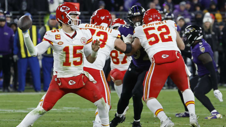 Jan 28, 2024; Baltimore, Maryland, USA; Kansas City Chiefs quarterback Patrick Mahomes (15) passes the ball against the Baltimore Ravens during the fourth quarter in the AFC Championship football game at M&T Bank Stadium. Mandatory Credit: Geoff Burke-USA TODAY Sports