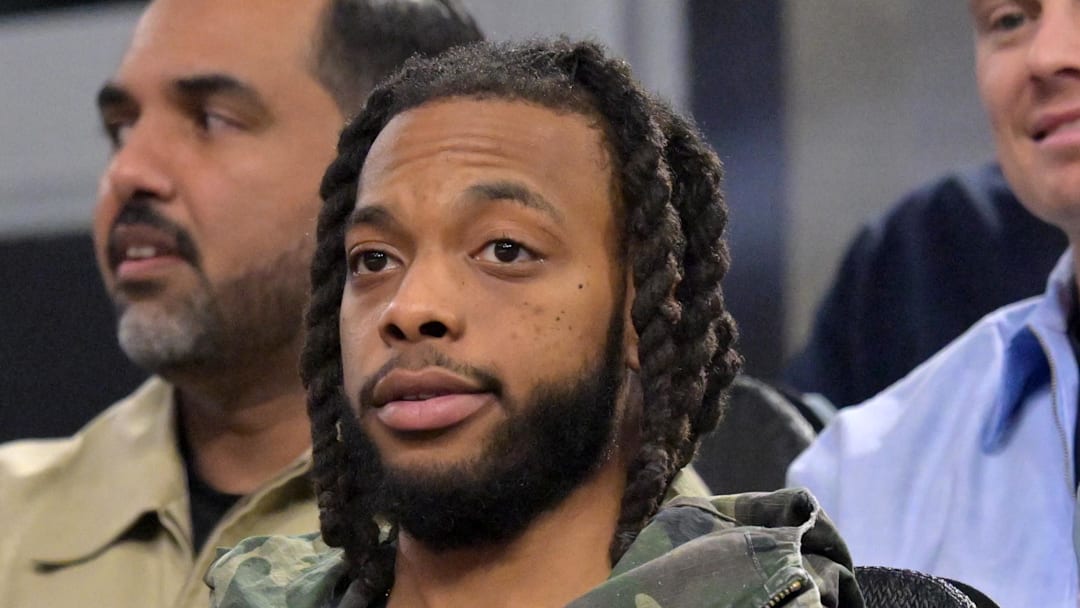 Los Angeles Clippers Darius Garland sits in the stands as he watches the game against the Cleveland Cavaliers.