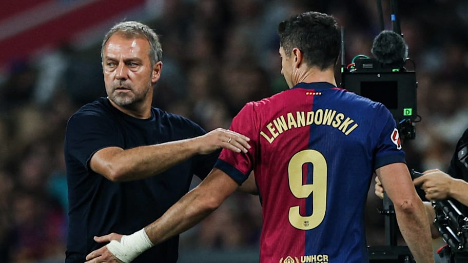 Robert Lewandowski (right) scored 42 goals in Hansi Flick's debut season at Barcelona. | IMAGO/DeFod
