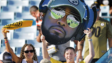 Steelers fans Jasmine Burt-Festa and her husband Brandon Festa show their team support with Jasmine's terrible towel and Brandon's Steelers head coach Mike Tomlin bighead before the start of Saturday's game. The Jacksonville Jaguars hosted the Pittsburgh Steelers in pre-season football at TIAA Bank Field in Jacksonville, FL Saturday, August 20, 2022. [Bob Self/Florida Times-Union]

Jki 082022 Bs Jags Vs Stee
