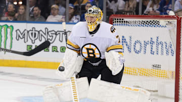 Sep 23, 2025; New York, New York, USA; Boston Bruins goaltender Joonas Korpisalo (70) makes a save during the second period of a preseason game against the New York Rangers at Madison Square Garden. Mandatory Credit: Vincent Carchietta-Imagn Images