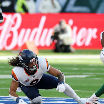 [US, Mexico & Canada customers only] Oct 12, 2025; Tottenham, UNITED KINGDOM; New York Jets running back Breece Hall (20) runs the ball against the Denver Broncos during an NFL International Series game at Tottenham Hotspur Stadium. Mandatory Credit: Paul Childs/Reuters via Imagn Images