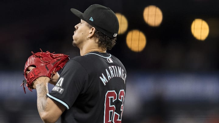 Sep 3, 2024; San Francisco, California, USA;  Arizona Diamondbacks pitcher Justin Martinez (63) prepares to pitch against the Arizona Diamondbacks during the eighth inning at Oracle Park. Mandatory Credit: John Hefti-Imagn Images