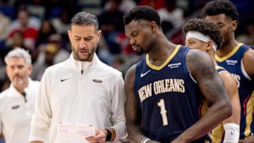 Nov 19, 2025; New Orleans, Louisiana, USA;  New Orleans Pelicans forward Zion Williamson (1) talks to interim head coach James Borrego against the Denver Nuggets during the first half  at Smoothie King Center. Mandatory Credit: Stephen Lew-Imagn Images