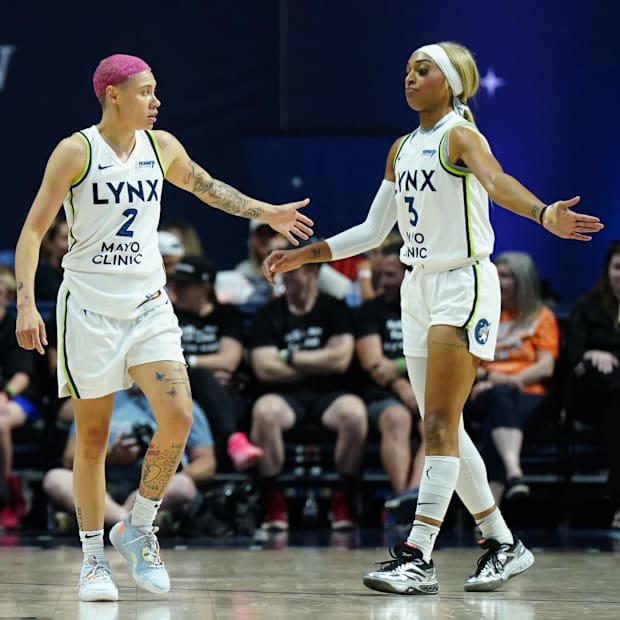 Minnesota Lynx guard Natisha Hiedeman and guard DiJonai Carrington. 