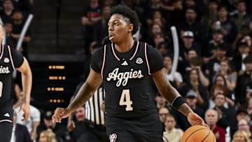 Feb 22, 2025; College Station, Texas, USA; Texas A&M Aggies guard Wade Taylor IV (4) brings the ball down court during the first half against the Tennessee Volunteers at Reed Arena. Mandatory Credit: Maria Lysaker-Imagn Images 