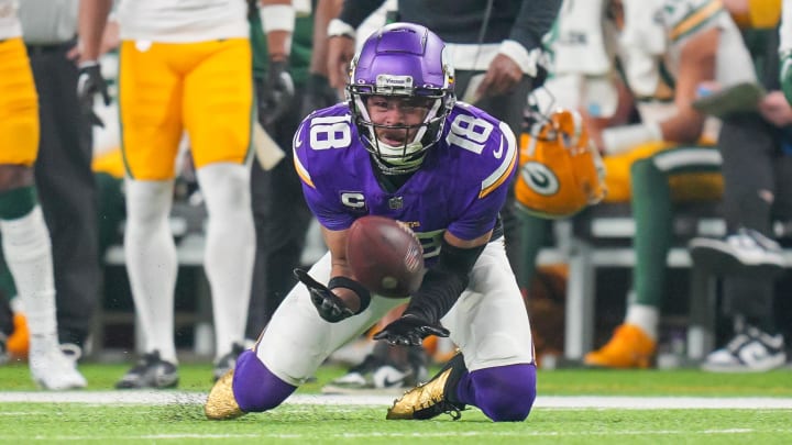 Dec 31, 2023; Minneapolis, Minnesota, USA; Minnesota Vikings wide receiver Justin Jefferson (18) catches a pass against the Green Bay Packers in the second quarter at U.S. Bank Stadium. Mandatory Credit: Brad Rempel-USA TODAY Sports