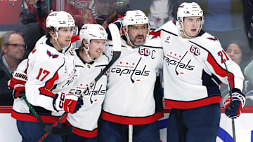 Mar 25, 2025; Winnipeg, Manitoba, CAN; Washington Capitals left wing Alex Ovechkin (8) celebrates his goal against the Winnipeg Jets with Washington Capitals center Dylan Strome (17), Washington Capitals defenseman Rasmus Sandin (38) and Washington Capitals center Aliaksei Protas (21) in the third period at Canada Life Centre. Mandatory Credit: James Carey Lauder-Imagn Images