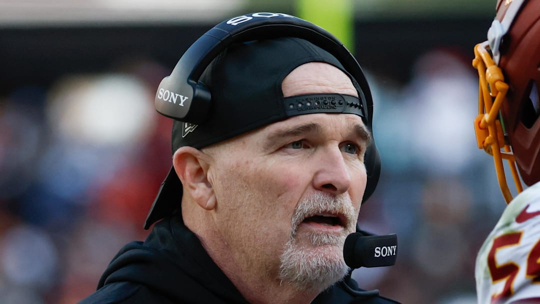 Dec 25, 2025; Landover, Maryland, USA;  Washington Commanders head coach Dan Quinn speaks to his players in the second half against the Dallas Cowboys at Northwest Stadium. Mandatory Credit: Amber Searls-Imagn Images