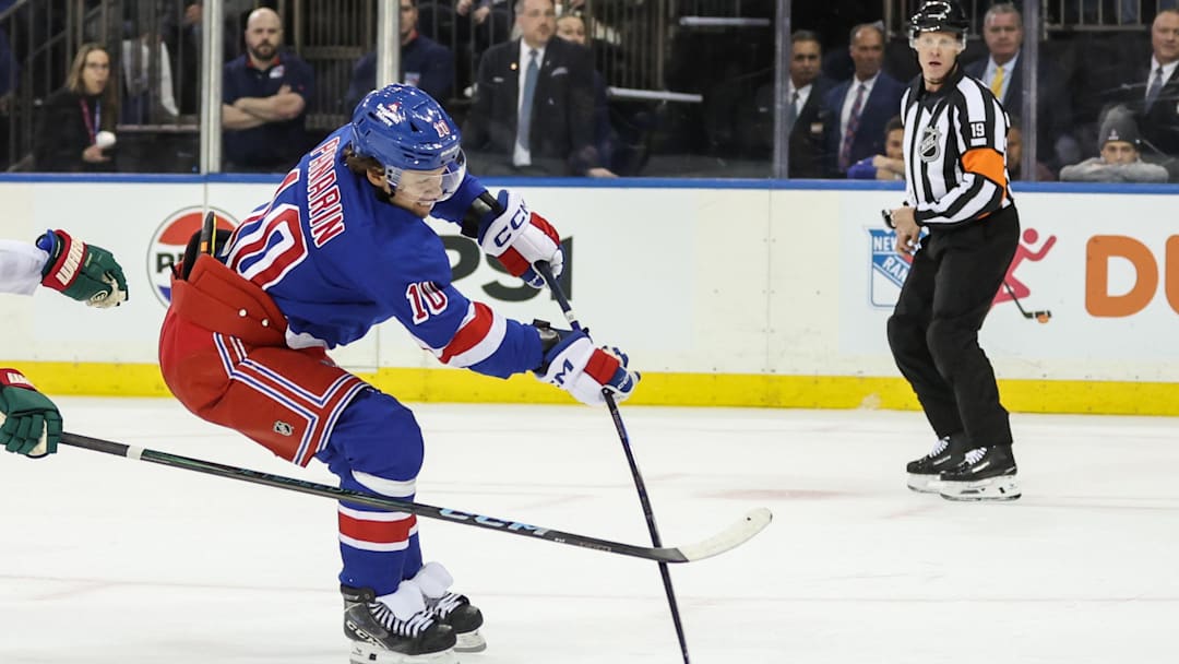 Apr 2, 2025; New York, New York, USA;  New York Rangers left wing Artemi Panarin (10) shoots in the second period against the Minnesota Wild at Madison Square Garden. Mandatory Credit: Wendell Cruz-Imagn Images