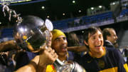 Boca Juniors players hold the Libertador...