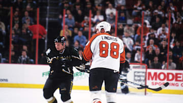 Mar 14, 1999; Philadelphia, PA, USA; FILE PHOTO; Dallas Stars center Tony Hrkac (41) in action against Philadelphia Flyers center Eric Lindros (88) at the First Union Center. Mandatory Credit: Lou Capozzola-USA TODAY NETWORK