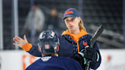 Coachella Valley Firebirds assistant coach Jessica Campbell talks to Firebirds forward Cameron Hughes (19) during practice at Acrisure Arena in Palm Desert, Calif., on Tuesday, May 28, 2024.