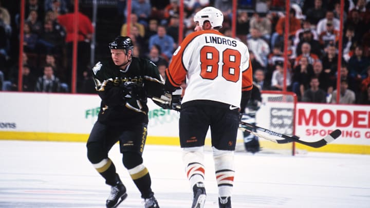Mar 14, 1999; Philadelphia, PA, USA; FILE PHOTO; Dallas Stars center Tony Hrkac (41) in action against Philadelphia Flyers center Eric Lindros (88) at the First Union Center.