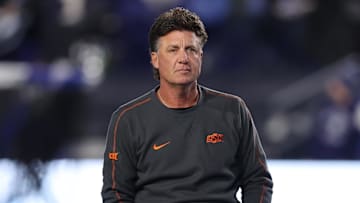 Oct 18, 2024; Provo, Utah, USA; Oklahoma State Cowboys head coach Mike Gundy looks on before the game against the Brigham Young Cougars at LaVell Edwards Stadium. Mandatory Credit: Rob Gray-Imagn Images