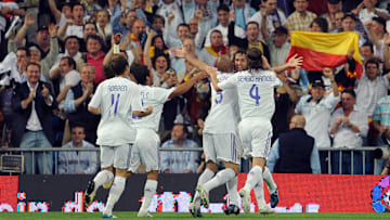 Real Madrid players celebrate after scor