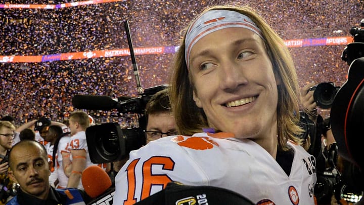 Clemson quarterback Trevor Lawrence (16) celebrates beating Alabama 44-16 after the College Football Championship game at Levi's Stadium in Santa Clara, California Monday, January 7, 2019.Clemson Alabama