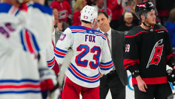 May 16, 2024; Raleigh, North Carolina, USA; Carolina Hurricanes head coach Rod Brind’Amour shake hands with New York Rangers defenseman Adam Fox (23) after the Rangers win in game six of the second round of the 2024 Stanley Cup Playoffs at PNC Arena. Mandatory Credit: James Guillory-USA TODAY Sports