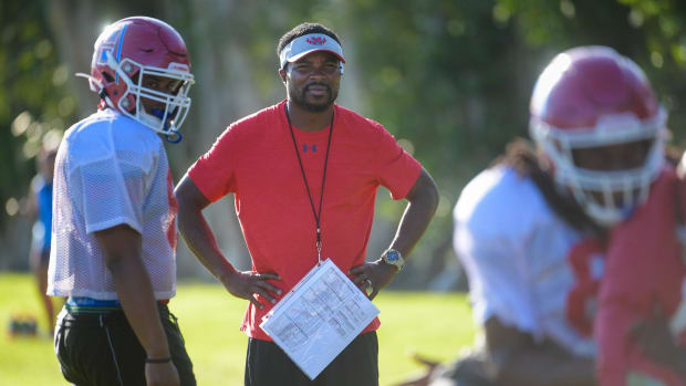 Manatee High School offensive coordinator Jacquez Green oversees practice on Wednesday. 