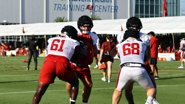 Tampa Bay Buccaneers offensive tackle Luke Haggard (72), offensive tackle Michael Niese (68) do drills during training camp