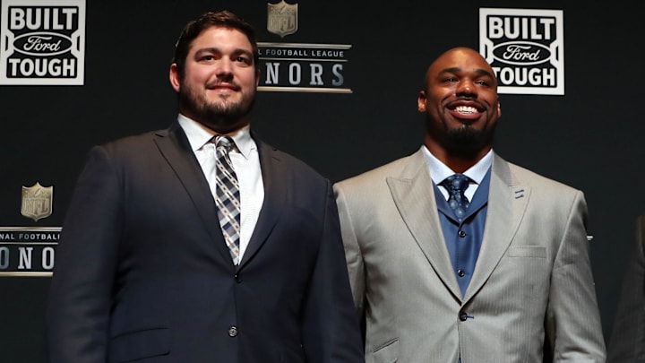 Dallas Cowboys players Zack Martin and Tyron Smith pose for photos iafter winning the Built Ford Tough Offensive Line of the Year.