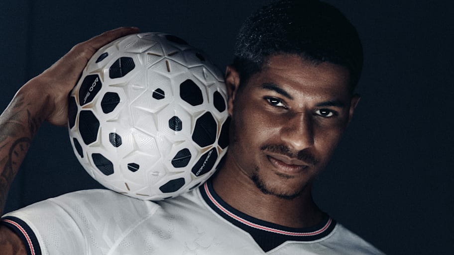 Marcus Rashford modeling England’s 2026 World Cup home kit.
