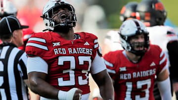 Texas Tech's A.J. Holmes Jr. reacts after a tackle against Oklahoma State in a Big 12 football game Saturday, Oct. 25, 2025, at Jones AT&T Stadium.