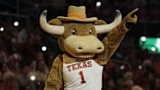 Texas Longhorns mascot Hook Em points to the crowd during the second half against the Arkansas Razorbacks at Moody Center.