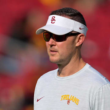 Oct 8, 2022; Los Angeles, California, USA;  USC Trojans head coach Lincoln Riley walks on the field prior to a game against the Washington State Cougars at United Airlines Field at Los Angeles Memorial Coliseum. Mandatory Credit: Jayne Kamin-Oncea-Imagn Images