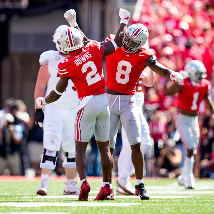 Ohio State Buckeyes safety Caleb Downs and linebacker Arvell Reese celebrate during the second half against Texas Longhorn