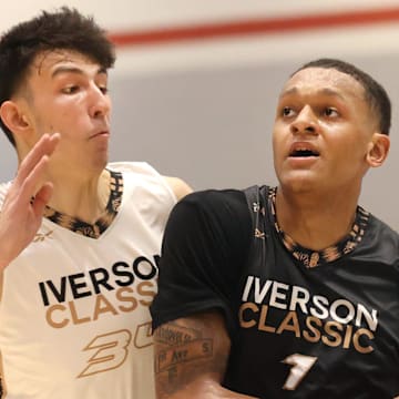 Chet Holmgren defends Paolo Banchero on a drive during the Iverson Classic All-American Game at Bartlett High School on Saturday, May 8, 2021