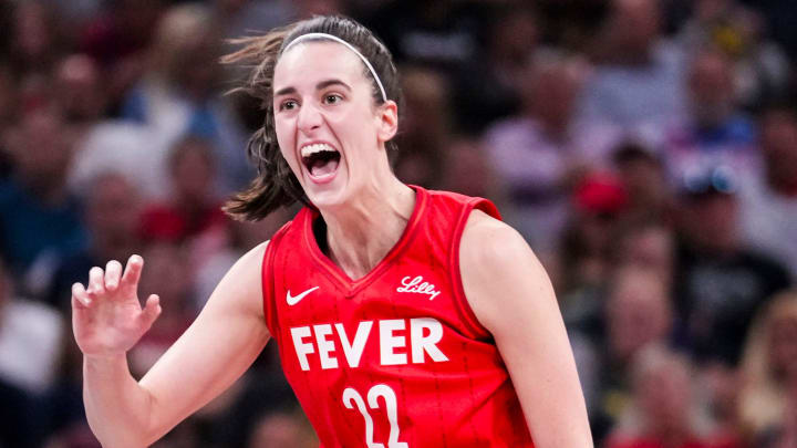 Indiana Fever guard Caitlin Clark reacts after shooting a three-pointer on Aug. 16 at Gainbridge Fieldhouse in Indianapolis.