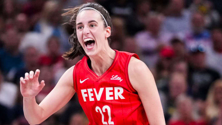 Indiana Fever guard Caitlin Clark reacts after shooting a 3-pointer Friday, Aug. 16, 2024, during the game at Gainbridge Fieldhouse in Indianapolis.