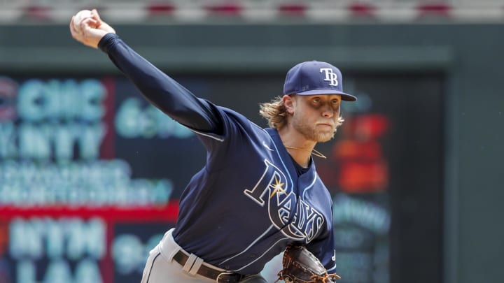 Jun 11, 2022; Minneapolis, Minnesota, USA; Tampa Bay Rays starting pitcher Shane Baz (11) throws to