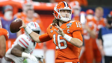Jan 1, 2021; New Orleans, LA, USA; Clemson Tigers quarterback Trevor Lawrence (16) attempts a pass against the Ohio State Buckeyes during the second half at Mercedes-Benz Superdome. Mandatory Credit: Chuck Cook-Imagn Images