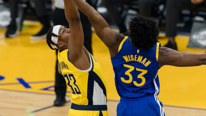 Jan 12, 2021; San Francisco, California, USA; Indiana Pacers center Myles Turner (left) and Golden State Warriors center James Wiseman (right) tip off in the first half at Chase Center. Mandatory Credit: John Hefti-USA TODAY Sports