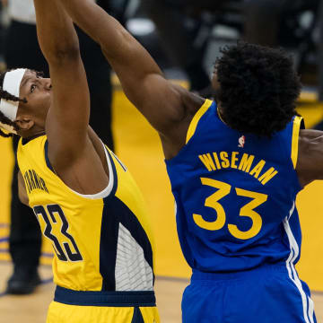 Jan 12, 2021; San Francisco, California, USA; Indiana Pacers center Myles Turner (left) and Golden State Warriors center James Wiseman (right) tip off in the first half at Chase Center. Mandatory Credit: John Hefti-USA TODAY Sports