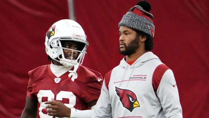 Arizona Cardinals wide receiver Greg Dortch (83) talks to quarterback Kyler Murray during practice at Cardinals Dignity Health training facility in Tempe on Aug. 30, 2023.