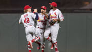 Jul 5, 2018; San Francisco, CA, USA; St. Louis Cardinals right fielder Harrison Bader (48) and center fielder Tommy Pham (28) and left fielder Marcell Ozuna (23) celebrate after the end of the game against the San Francisco Giants at AT&T Park. Mandatory Credit: Neville E. Guard-USA TODAY Sports