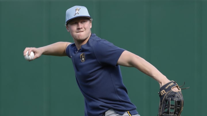 Apr 22, 2024; Pittsburgh, Pennsylvania, USA;  Milwaukee Brewers outfielder Joey Wiemer (28) warms up before a game against the Pittsburgh Pirates at PNC Park. Mandatory Credit: Charles LeClaire-USA TODAY Sports