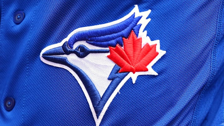 Mar 25, 2018; Dunedin, FL, USA; A view of the Blue Jays logo on an official Majestic game jersey during a game between the Pittsburgh Pirates and the Toronto Blue Jays at Florida Auto Exchange Stadium. Mar 25, 2018; Dunedin, FL, USA; A view of the Blue Jays logo on an official Majestic game jersey during a game between the Pittsburgh Pirates and the Toronto Blue Jays at Florida Auto Exchange Stadium.