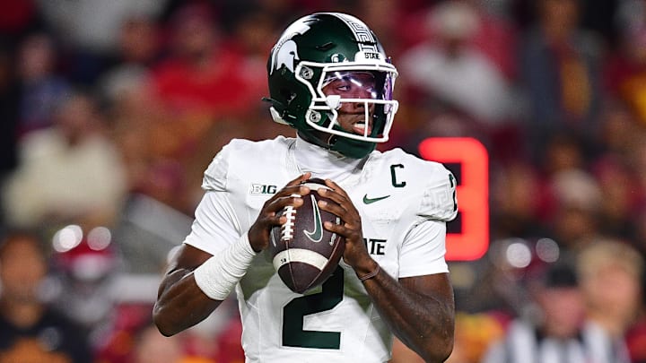 Sep 20, 2025; Los Angeles, California, USA; Michigan State Spartans quarterback Aidan Chiles (2) drops back to pass against the Southern California Trojans during the second half at the Los Angeles Memorial Coliseum. Mandatory Credit: Gary A. Vasquez-Imagn Images Sep 20, 2025; Los Angeles, California, USA; Michigan State Spartans quarterback Aidan Chiles (2) drops back to pass against the Southern California Trojans during the second half at the Los Angeles Memorial Coliseum. Mandatory Credit: Gary A. Vasquez-Imagn Images