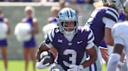 Sep 27, 2025; Manhattan, Kansas, USA; Kansas State Wildcats running back Dylan Edwards (3) looks for room to run during the fourth quarter against the UCF Knights at Bill Snyder Family Football Stadium. Mandatory Credit: Scott Sewell-Imagn Images