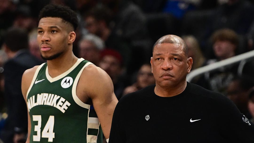 Apr 3, 2024; Milwaukee, Wisconsin, USA; Milwaukee Bucks head coach Doc Rivers and forward Giannis Antetokounmpo (34) looks on in the fourth quarter against the Memphis Grizzlies at Fiserv Forum. Mandatory Credit: Benny Sieu-Imagn Images