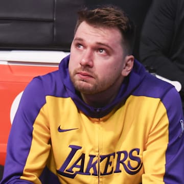 Apr 9, 2025; Dallas, Texas, USA;  Los Angeles Lakers guard Luka Doncic (77) reacts while watching a tribute video before the game against the Dallas Mavericks at American Airlines Center. Mandatory Credit: Kevin Jairaj-Imagn Images