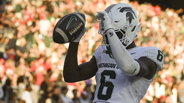 Sep 7, 2024; College Park, Maryland, USA; *Michigan State Spartans wide receiver Nick Marsh (6) celebrates after scoring a touchdown during the second half against the Maryland Terrapins  at SECU Stadium. Mandatory Credit: Tommy Gilligan-Imagn Images