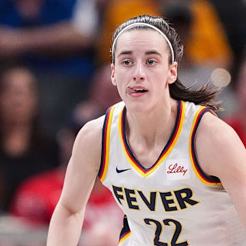 Indiana Fever guard Caitlin Clark (22) rushes up the court Friday, July 12, 2024, during the game at Gainbridge Fieldhouse in Indianapolis. The Indiana Fever defeated the Phoenix Mercury, 95-86.