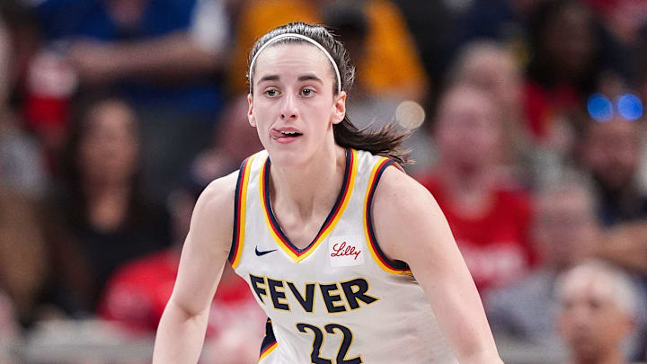 Indiana Fever guard Caitlin Clark (22) rushes up the court Friday, July 12, 2024, during the game at Gainbridge Fieldhouse in Indianapolis. The Indiana Fever defeated the Phoenix Mercury, 95-86.