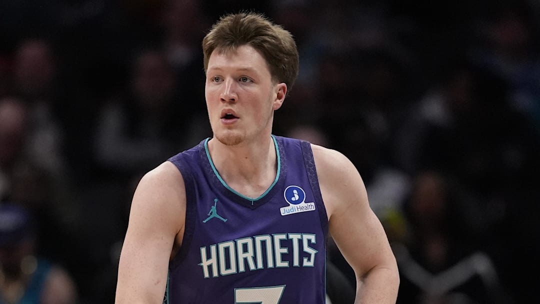 Mar 17, 2026; Charlotte, North Carolina, USA; Charlotte Hornets guard Kon Knueppel (7) brings the ball up court against the Miami Heat during the first quarter at Spectrum Center. Mandatory Credit: Jim Dedmon-Imagn Images